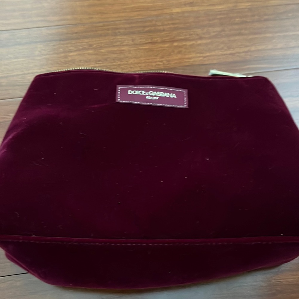 Maroon velvet makeup bag or travel bag. Never used smoke free home.